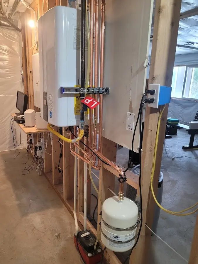 Licensed plumber repairing a kitchen sink in Lockport